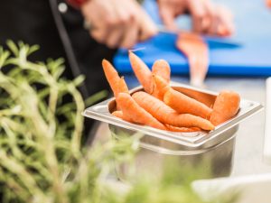 A closeup of organic carrots being used in the kitchen of the hotel SCHWARZWALD PANORAMA