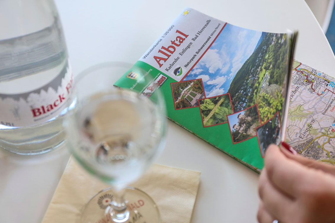 A brochure of the Albtal region resting on a table at the Hotel Schwarzwald Panorama